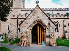 Figures outside Edwinstowe church